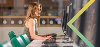 Girl sitting at a computer