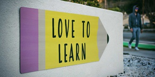 sign on a college campus with the words 