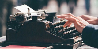 a person using a typewriter