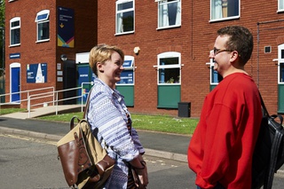 Two Students standing outside City Campus Standard accommodation