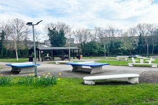 Ping pong tables and benches on Lomas Street