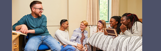 Students in the bedroom of a City Campus ensuite accommodation facility