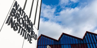 Side angle view of the National Brownfield Institute sign