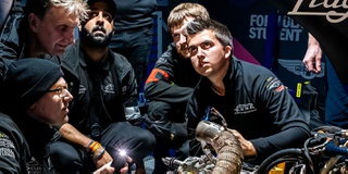 Photograph of UWR race team students in the pit lane