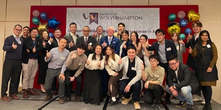 A group of students looking at the camera after graduating in Hong Kong