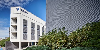 A picture of the Housman Building at City Campus