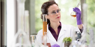 A stock image of a woman in a laboratory