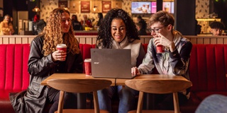students at a laptop