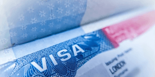 close up photograph of visa documentation