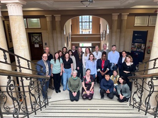 The CLS cohort 2025 gather together for a group picture at the reception of Wulfruna House, University of Wolverhampton