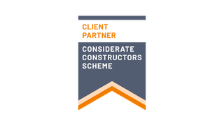 The Considerate Constructor Scheme logo in grey and orange with white writing