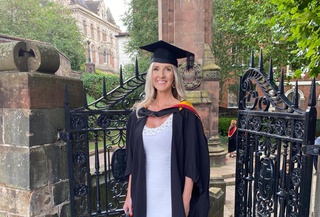 Maddison Walker in robes at her graduation from University of Wolverhampton