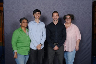 Global Graduate Returns to Serve