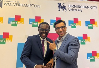 Manager for the That's Me! project Deinsam Ogan shakes hands with Prof. Prashant Pillai, Pro Vice-Chancellor for Research and Knowledge Exchange from University of Wolverhampton.