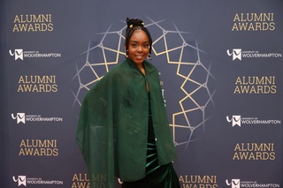 Jackeshia pictured against an Alumni Awards 2025 backdrop