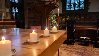 candles on a church alter