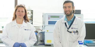 Can an algae by-product be used in acidic drinks to help protect teeth? 