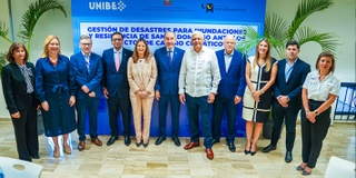 A group of people attending a Disaster Management event group shot