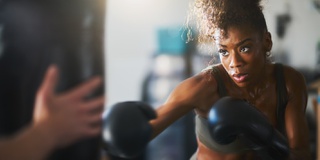 Image of a woman boxing to be used for the female takeover events