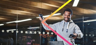 Photograph of a student using motion sensor technology