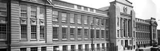 A black and white photograph of the University of Wolverhampton's Wulfruna building.