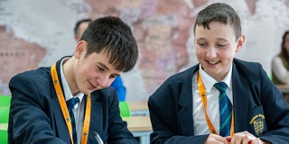 Two school pupils enjoying an engaging day out at the University